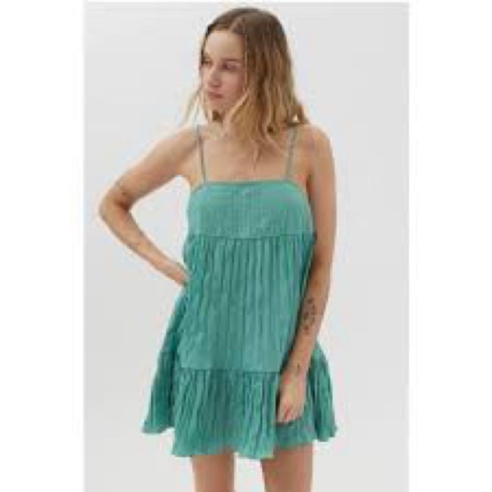 Urban Outfitters Lucia Plisse tiered mini dress.